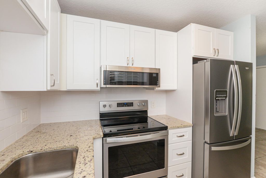 Photo of 10 Lake Vista Trail #203, Port Saint Lucie, FL 34952 (MLS # R10983524)