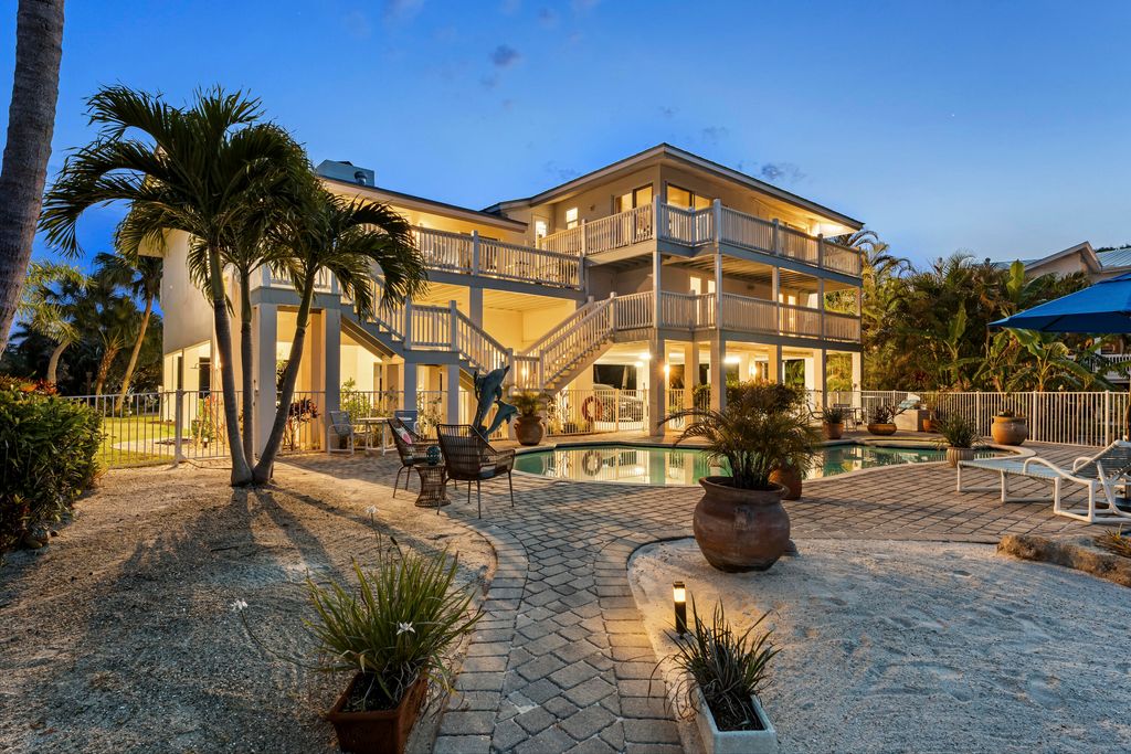 Photo of 8 Herons Nest, Sewalls Point, FL 34996 (MLS # B26024647)