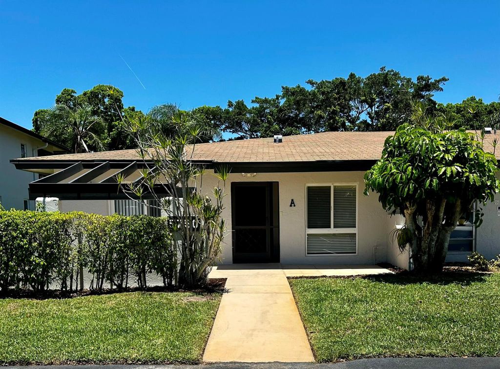 Photo of 5750 Princess Palm Ct #Unit A, Delray Beach, FL 33484 (MLS # R10983584)