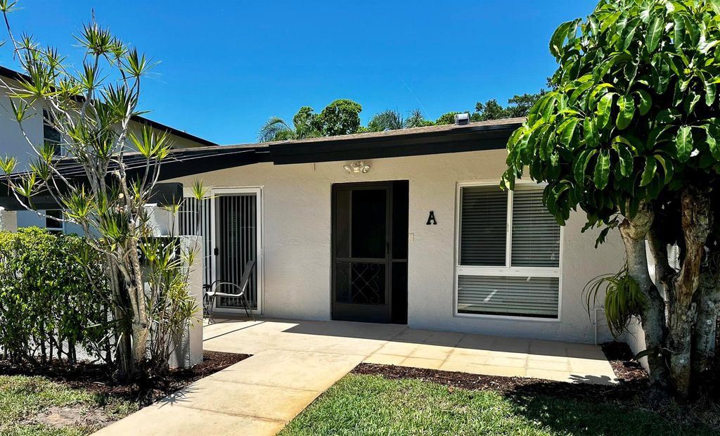 Photo of 5750 Princess Palm Ct #Unit A, Delray Beach, FL 33484 (MLS # R10983584)