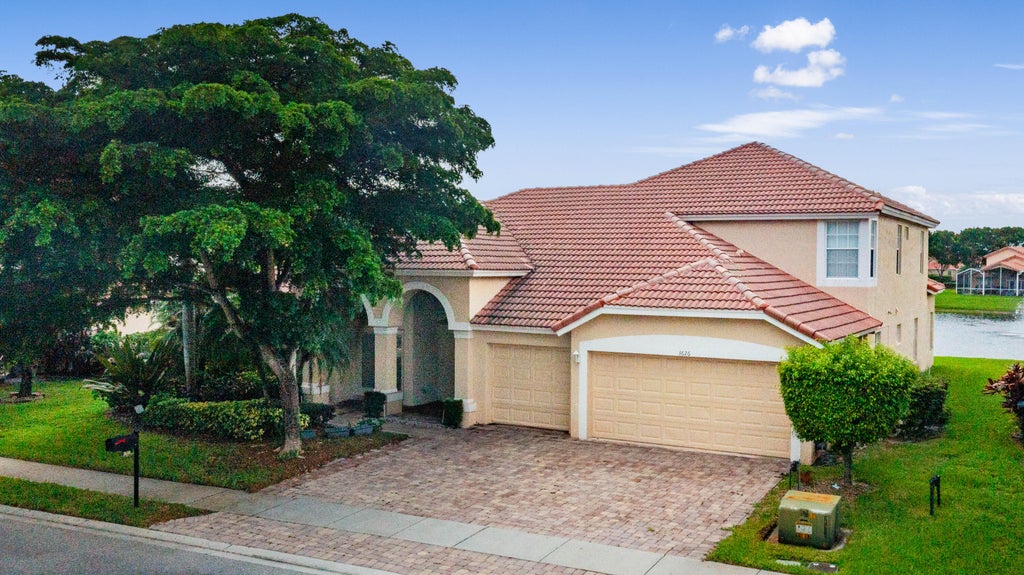 Photo of 3626 E HAMILTON Key, West Palm Beach, FL 33411 (MLS # B26078656)