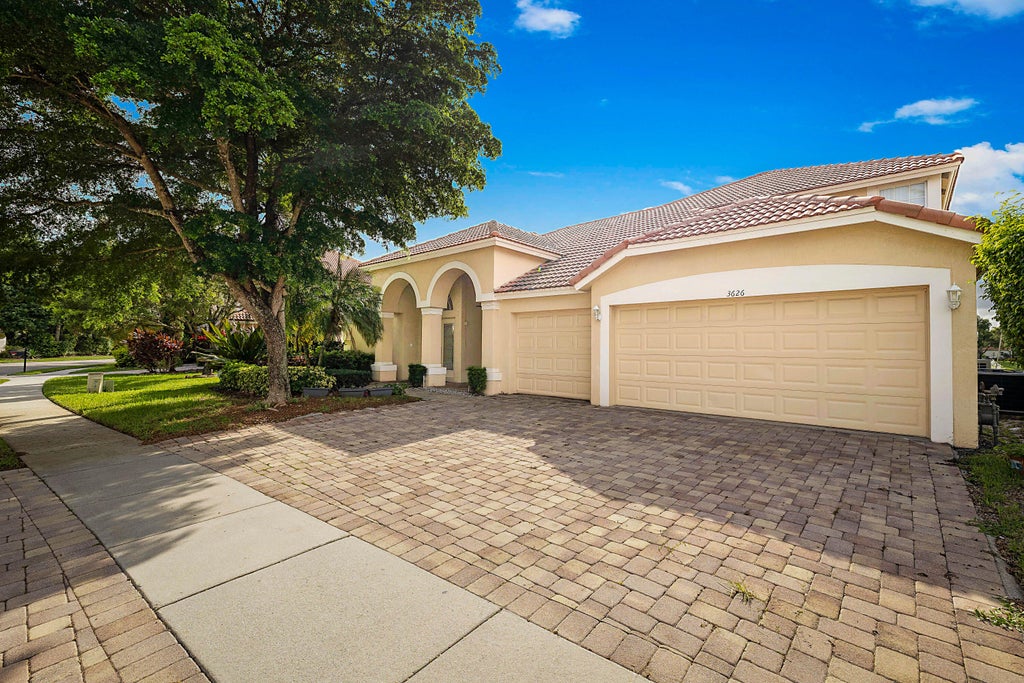 Photo of 3626 E HAMILTON Key, West Palm Beach, FL 33411 (MLS # B26078656)