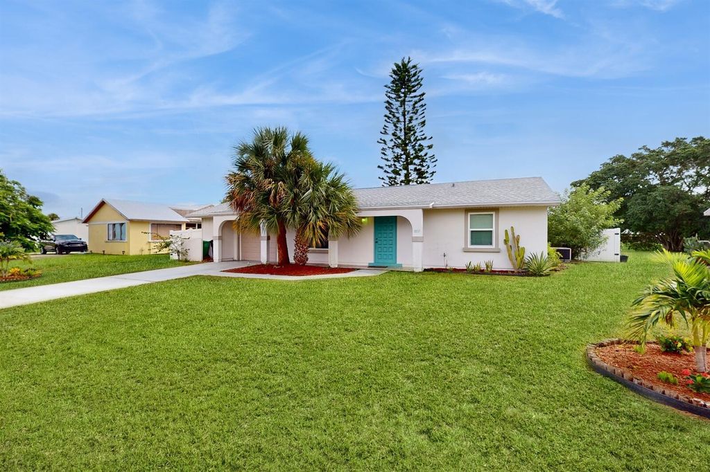 Photo of 1857 SE Burgundy Lane, Port Saint Lucie, FL 34952 (MLS # R11020684)