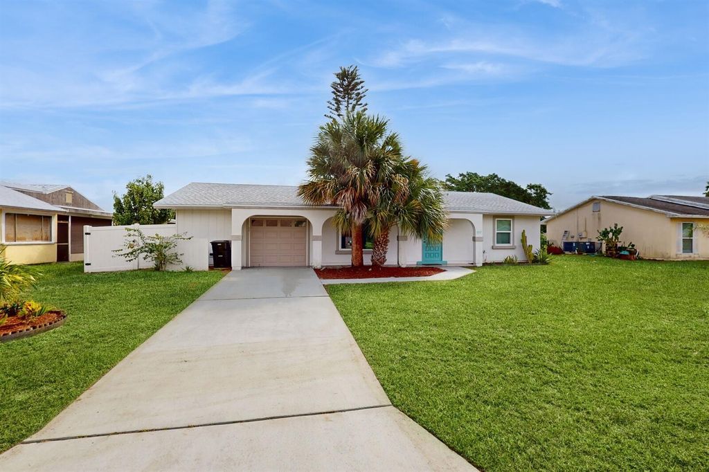 Photo of 1857 SE Burgundy Lane, Port Saint Lucie, FL 34952 (MLS # R11020684)