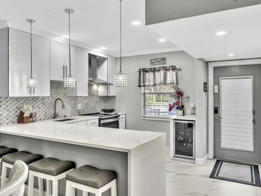 Rockstar Beautiful describes this Immaculate Modern Open Concept Design in the sought after Neighborhood of Oriole Gardens 3 !  A 55+ Community.  This home has been Professionally Remodel with every attention to detail.  Used as a Vacation Home this home is Brand New and Beautiful.  
Additional Perks: "On-Site Laundry" and "Large Storage Locker," conveniently located just steps from your front door! Conveniently located with Coral Square Mall just down the Road, Publix Grocery around the block.  See attachments in the MLS. 
Homes like this rarely come on the Market,  Don't Wait, call Today!