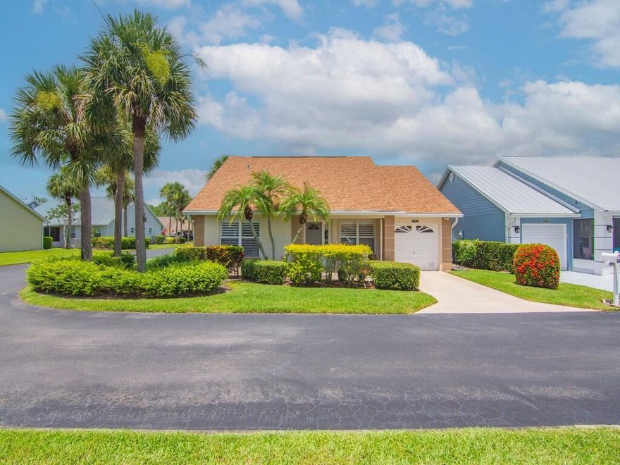 Beautiful two-bedroom, two-bathroom corner lot home with the potential to convert the den into a third bedroom, with a 1 car garage.  NEW ROOF 2022, A/C 2022, W/H 2024, NEW ELECTRICAL PANEL AND RE-PIPED PLUMBING. The home is equipped with Shutters for Hurricane Protection and beautiful plantation shutters. Water filtration system for whole house and Gas Stove. Top of the line Washer and Dryer and Shed for extra storage. Screened and enclosed tiled lanai, perfect for entertainment. The Isle of Tuscany includes guest parking spaces and exterior painting. Hassle free HOA includes Lawn Care, internet, cable, and manned guard gate. Welcoming Resort style Clubhouse with recreational facilities and many interesting clubs and events. Convenient to I-95, banks, grocery stores, and medical care.