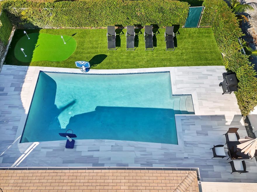 Discover your dream getaway in this stunning seasonal rental! This fully renovated 4-bedroom, 2-bath home features a sparkling heated pool and a spacious, fenced-in yard—perfect for relaxation and fun. Ideally located just moments away from the vibrant Atlantic Avenue and beautiful beaches, this is the perfect spot to create lasting memories. Don't miss out on this incredible opportunity!