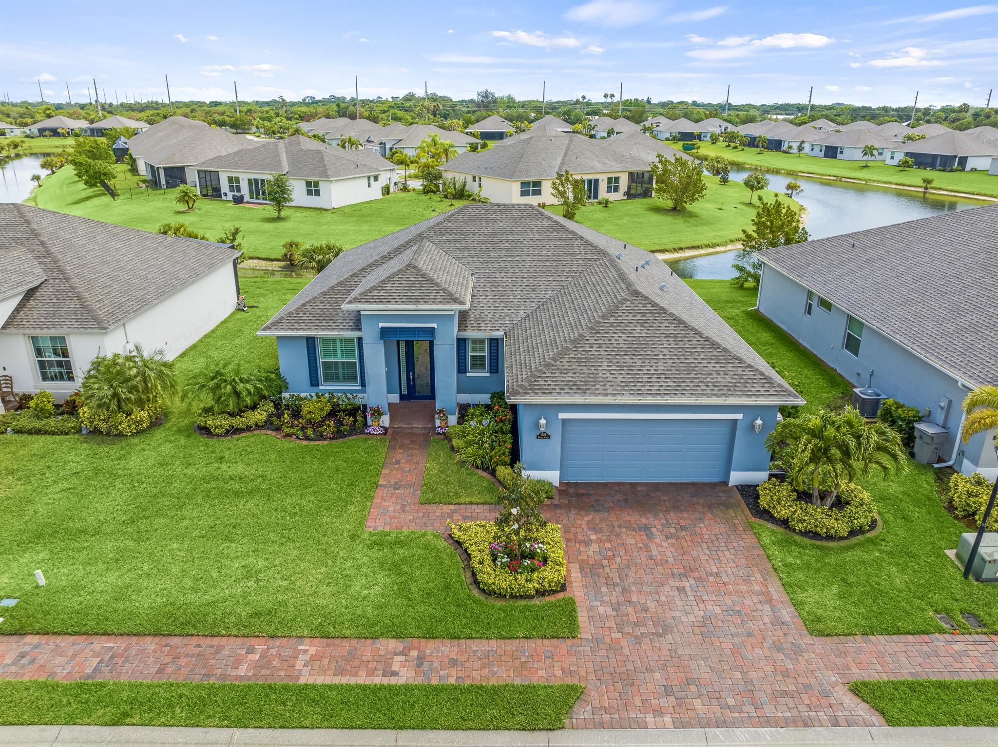 Welcome home! If the builder upgrades weren't enough, the sellers have added custom updates that can be seen through out the home! This Seville floor plan built by GHO is 2/2 with a den (that could easily be converted to a 3rd bedroom!) The current owners opted for the flipped kitchen and formal dining option allow additional light through. This lake front property is centrally located in Vero Beach. Your next home has recently been landscaped by local company, CW Lewis. The primary bedroom offers not 1 but 2 walk in closets! Be sure to ask for the extensive upgrade list that we have compiled.