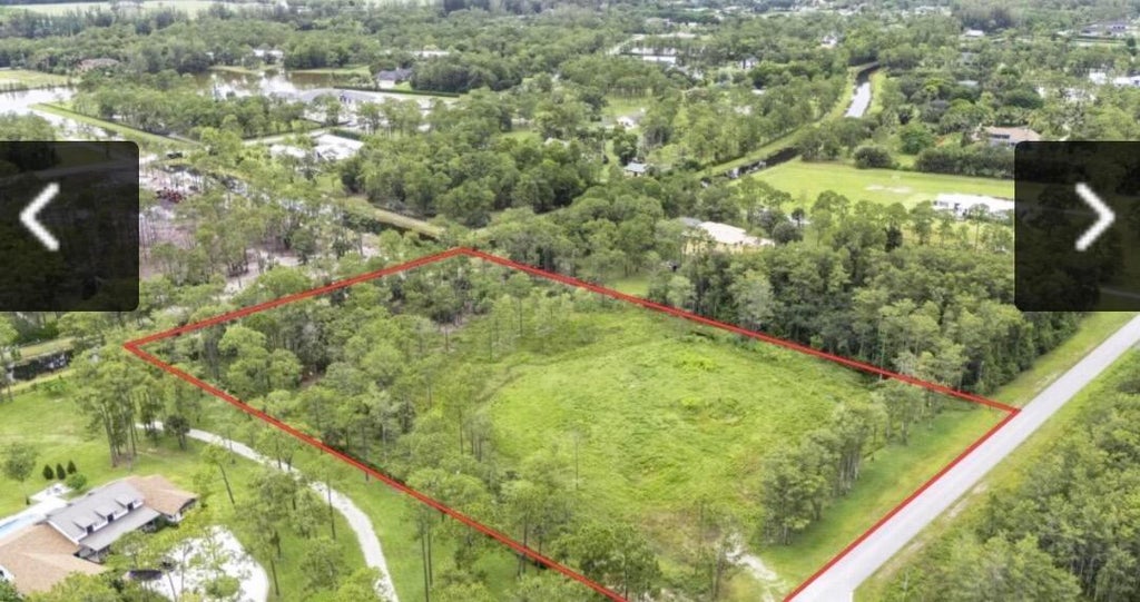 Photo of 5637 COUGARS PROWL, Lake Worth, FL 33449 (MLS # B26078204)
