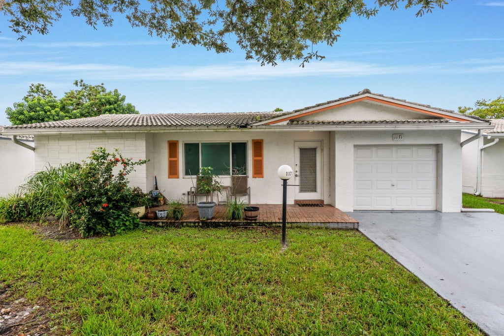 Photo of 1171 NW 89th Avenue, Plantation, FL 33322 (MLS # B26084663)