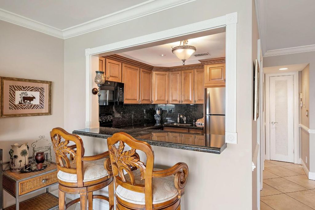 Photo of 400 Wilma Circle #309, Riviera Beach, FL 33404 (MLS # R11156832)