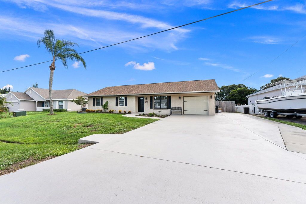 Photo of 2181 SE Dolphin Road, Port Saint Lucie, FL 34952 (MLS # R11024713)