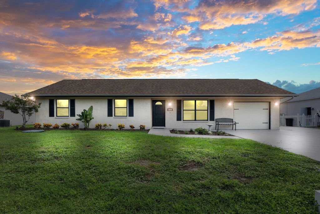 Photo of 2181 SE Dolphin Road, Port Saint Lucie, FL 34952 (MLS # R11024713)