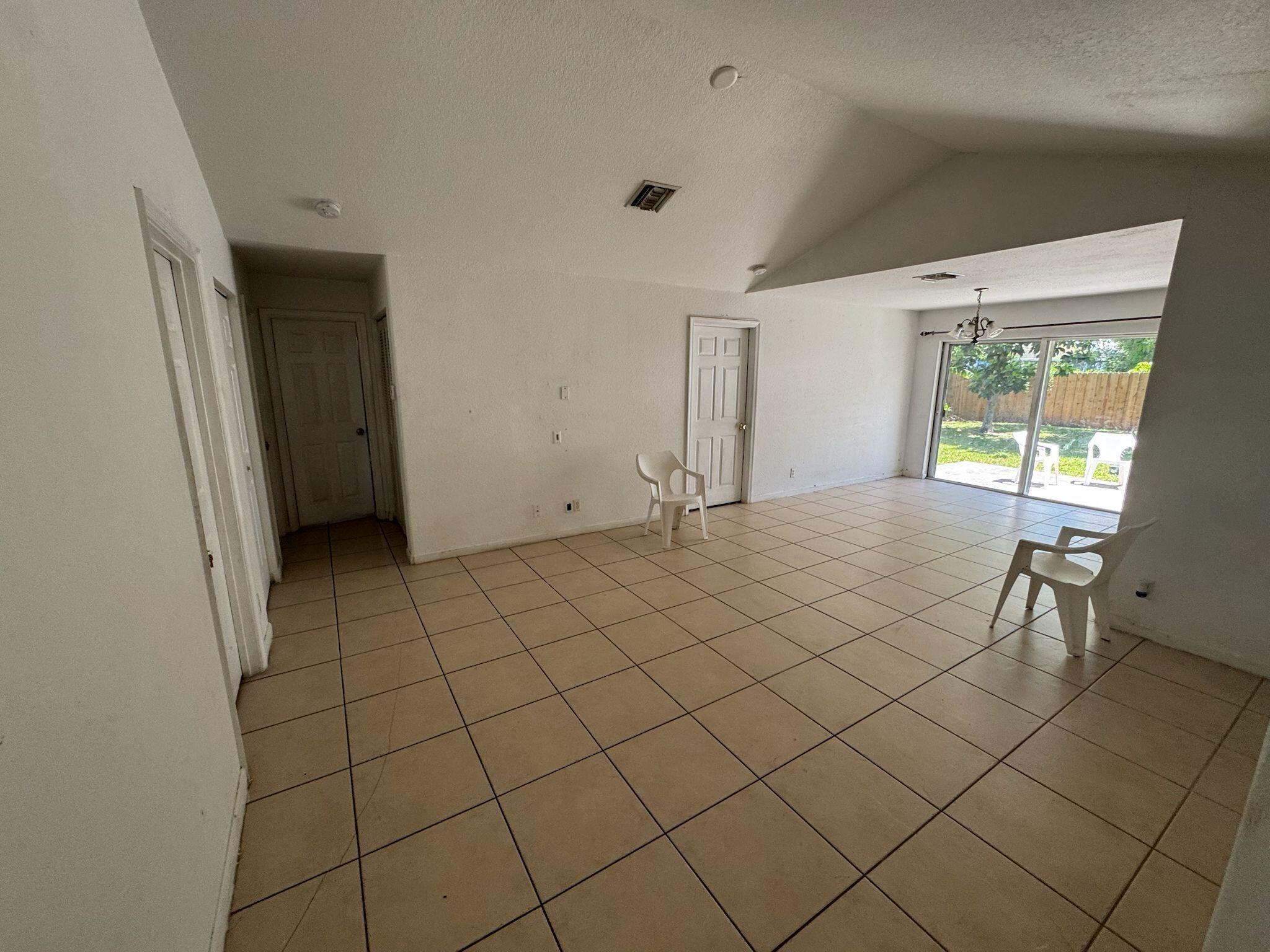 Nestled in a peaceful West Palm Beach neighborhood, 2380 Saranac Ave offers a warm and inviting atmosphere with a bright interior and spacious backyard-an ideal place to call home