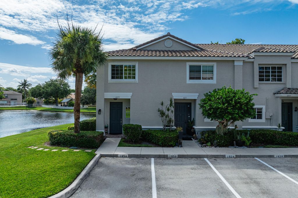 Photo of 4859 NW 58TH Manor, Coconut Creek, FL 33073 (MLS # B26055864)