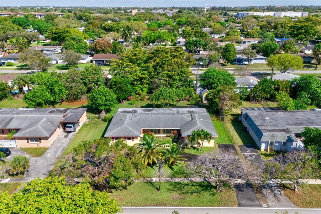 Photo of 6865 NW 11th Place, Plantation, FL 33313 (MLS # F10489761)