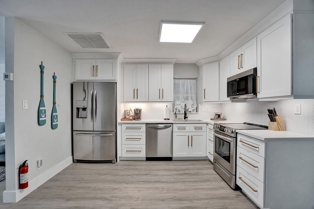 Photo of 1969 NE 5th Street #1-2, Deerfield Beach, FL 33441 (MLS # B26029190)