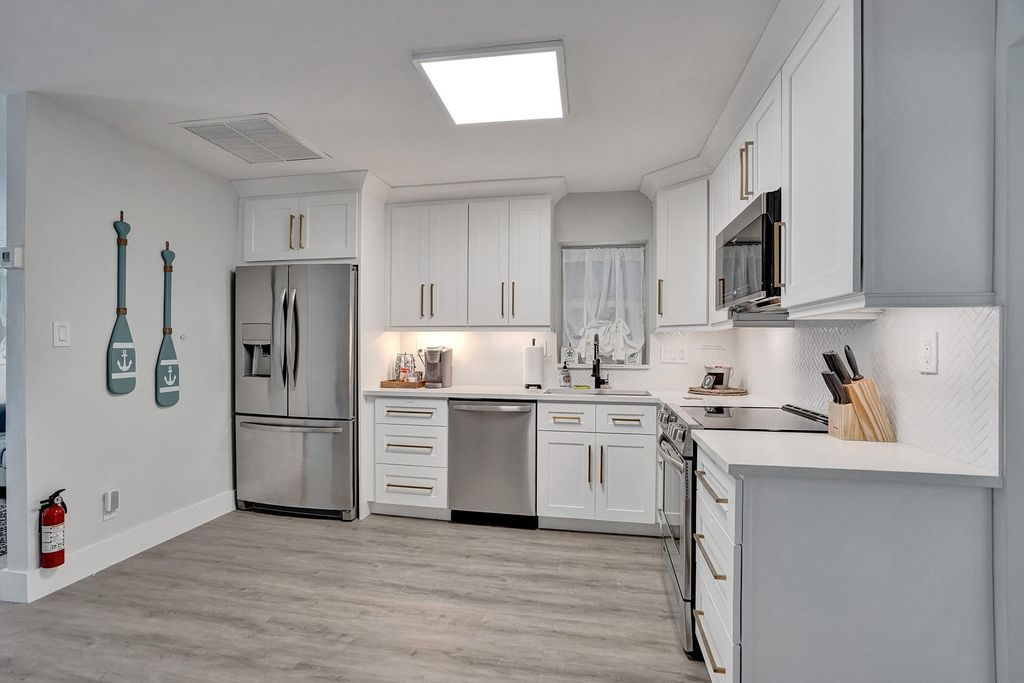 Photo of 1969 NE 5th Street #1-2, Deerfield Beach, FL 33441 (MLS # B26029190)