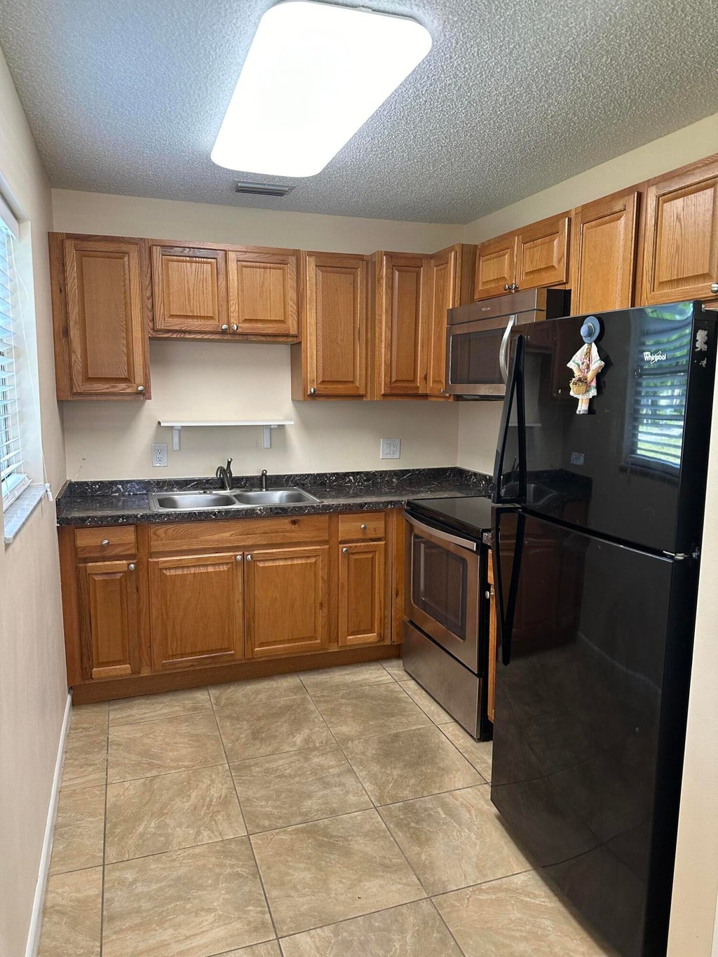 Photo of 26 Lake Vista Trail #103, Port Saint Lucie, FL 34952 (MLS # R10974763)