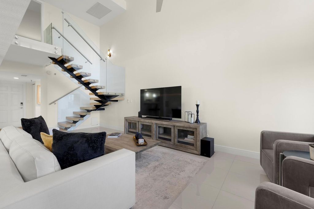 Photo of 665 SE 21st Avenue #104, Deerfield Beach, FL 33441 (MLS # R11150936)