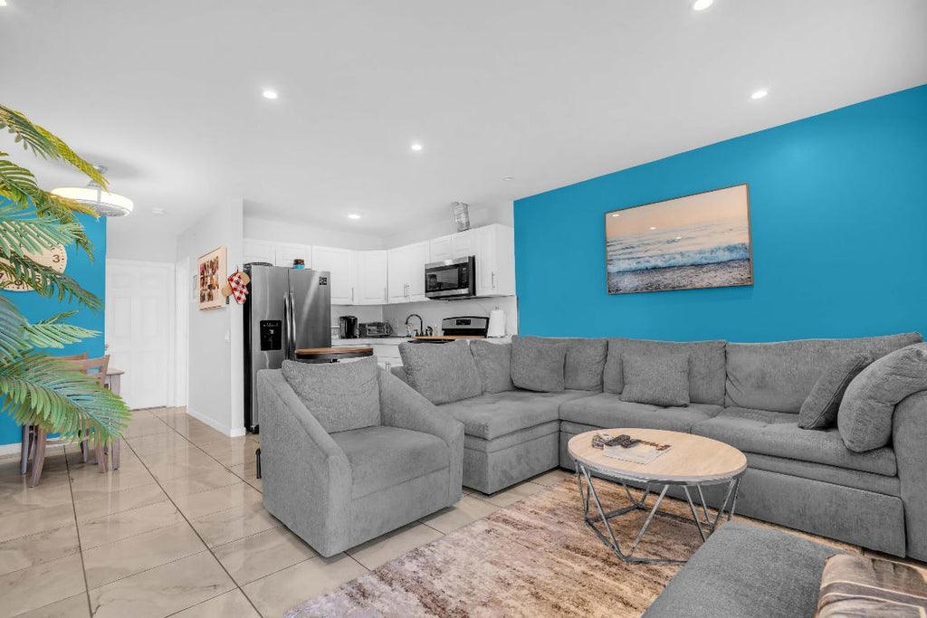Photo of 301 E Mcnab Road #103, Pompano Beach, FL 33060 (MLS # R11128644)