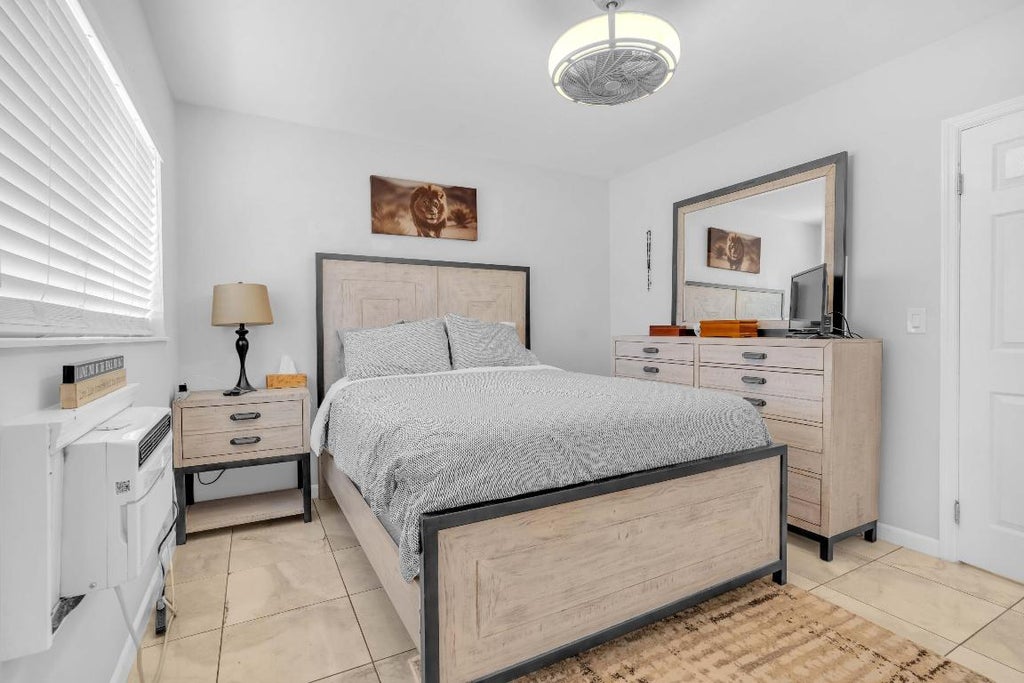 Photo of 301 E Mcnab Road #103, Pompano Beach, FL 33060 (MLS # R11128644)