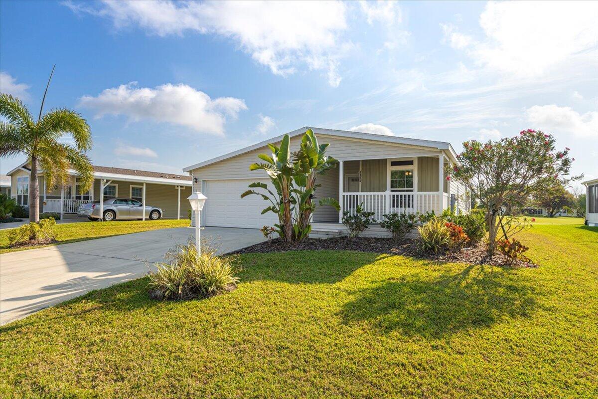 Welcome to Savanna Club, a sought-after 55+ community where this beautifully designed 2-bedroom, 2-bathroom home with den delivers style, comfort, and convenience. Built in 2019, the residence showcases an open concept layout with soaring tray ceilings and expansive windows that fill the home with natural light.The chef's kitchen is a standout with stainless steel appliances and custom cabinetry, offering both function and elegance. A flexible den/office with wet bar adds extra living space for work or entertaining. The primary suite features a spa-inspired bath with a walk-in shower, while the 2-car garage and irrigation well provide everyday practicality.Set on a land lease, this property enjoys golf course views and access to an abundance of community amenities, from clubs an
