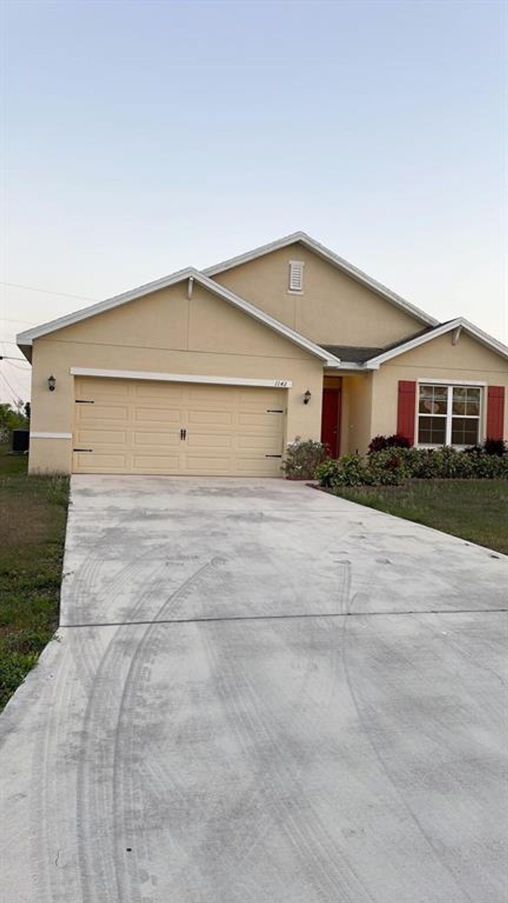 Photo of 1142 SW Ingrassina Avenue, Port Saint Lucie, FL 34953 (MLS # R10875774)