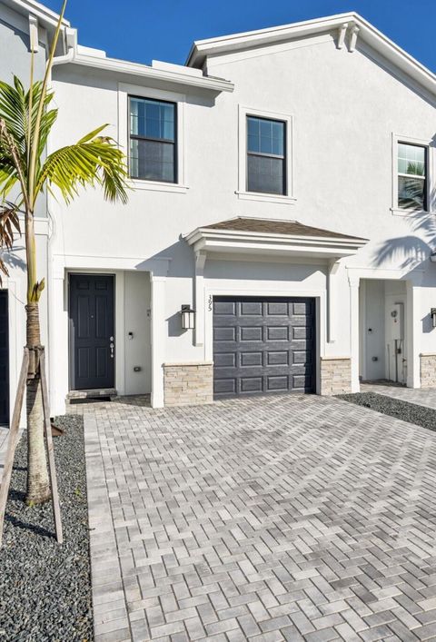 Photo of 395 SW Sally Way, Stuart, FL 34997 (MLS # B26017248)