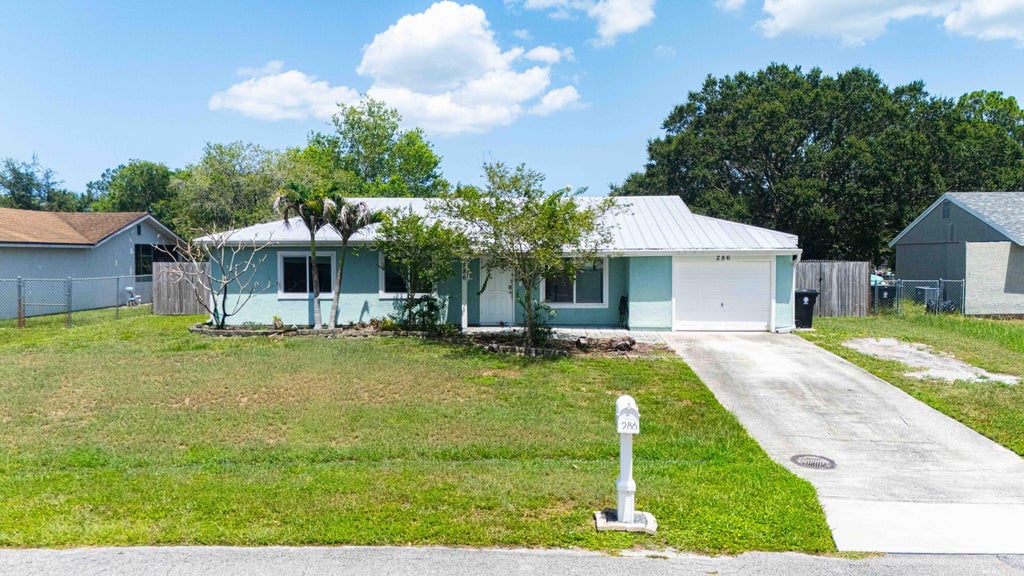 Photo of 286 SW KENTWOOD Road, Port Saint Lucie, FL 34953 (MLS # B26052114)
