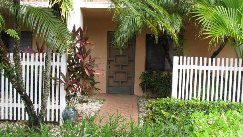 Offered UNFURNISHED for $2100 or FURNISHED for $2300. This cozy and larger 1230sq ft 2 bed 2 bath unit is on the ground floor in sought after Huntington Lakes. Sip coffee on the screened in patio out back with a peaceful view of the new lake. There's a garden view in the front and bringing packages in is easy as it's only a few steps to parking as it is right in front of your door! If FURNISHED the master has a comfy king-sized bed with a large smart tv and alcove with another sofa for lounging or napping and the den has a sleeper sofa and a smart tv with another full bathroom. Both baths are fully updated! The living room has a sleeper sofa as well. There's an eat-in kitchen and larger dining area as well as a washer/dryer. This 55+ popular community has a wonderful clubhouse with many