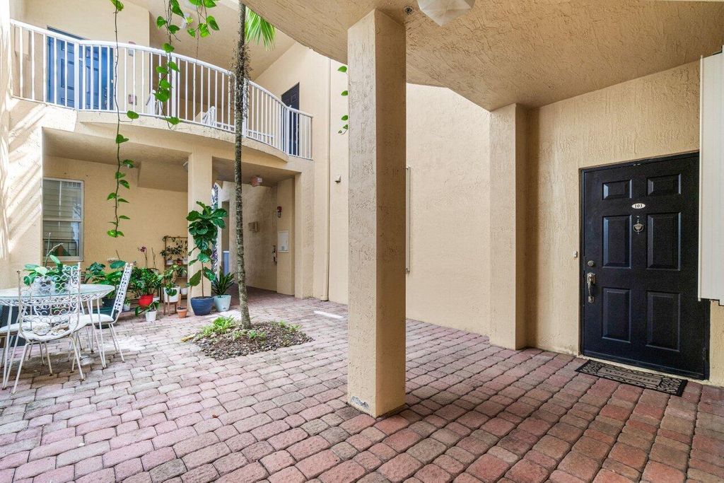 Photo of 110 Jacaranda Country Club Drive #103, Plantation, FL 33324 (MLS # R11082218)