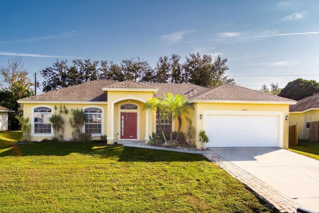 Photo of 3353 SW Mundy Street, Port St Lucie, FL 34953 (MLS # R10850120)