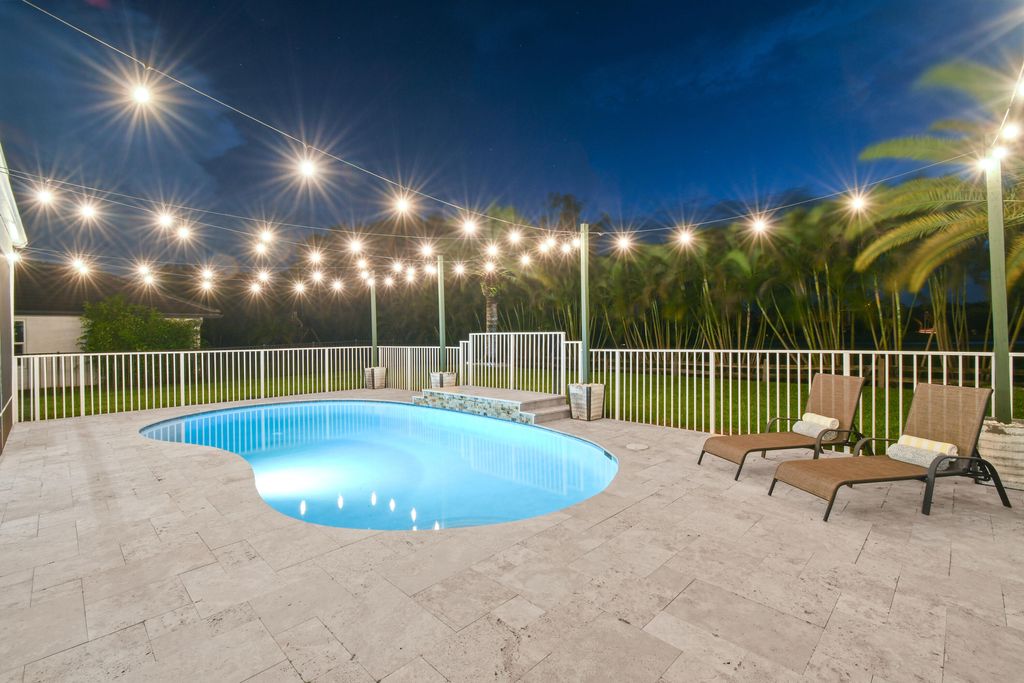 Photo of 6561 Rock Creek Drive, Lake Worth, FL 33467 (MLS # R11131651)