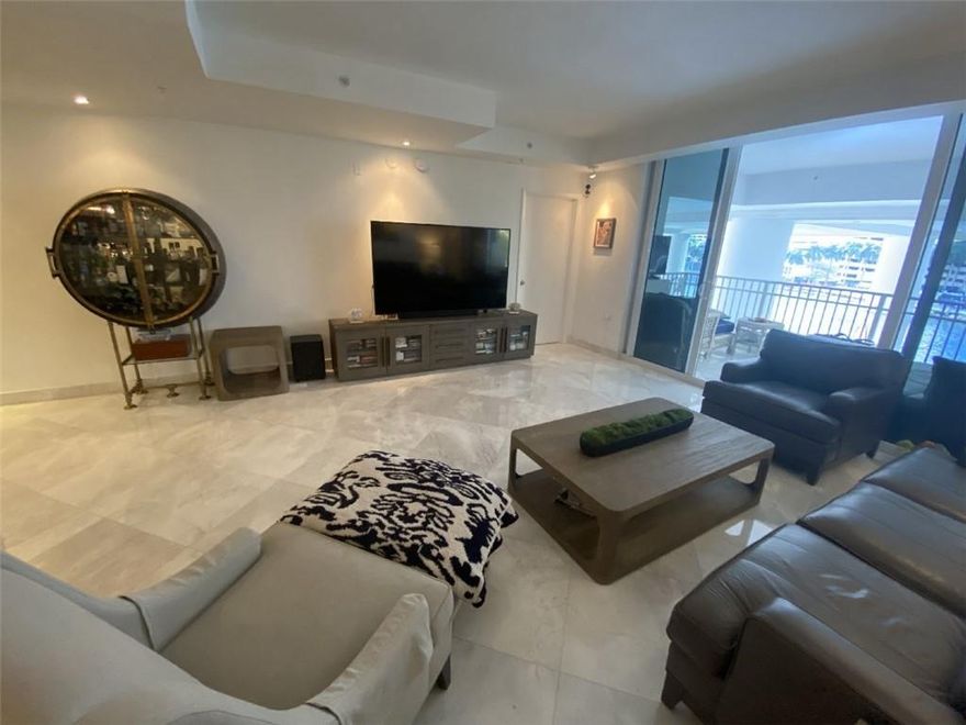 WOW! BEST BUY RELOCATION, RELOCATION, REDUCED $225,000 FOR FAST SALE! BRICKELL KEYS, DESIRED BUILDING "THE COURTS" ALL IMPACT GLASS. FULLY RENOVATED 3 BR. 3.5 BA. WITH 2,130 SF, OPEN GREAT ROOM, THAT LIVES LIKE A HOUSE! GLEAMING LIGHT MARBLE THROUGHOUT. KITCHEN WITH HUGE ISLAND, & WHITE WATERFALL COUNTER TOPS. FULL SIZE LAUNDRY RM WITH LOTS OF STORAGE, & 2022 WASHER & DRYER, 2019 A/C & WATER HTR. ALL BRS ARE OVER SIZED WITH ON SUITE BATHS. (1 BR. TECHNICALLY A DEN/OFFICE) ALL HAVE BIG BUILT OUT CLOSETS.  GORGEOUS WATER VIEWS FROM YOUR COVERED BALCONY. A TUCKED AWAY LOCATION WITH NO NEIGHBORS ON EITHER SIDE, 2 PARKING SPOTS & STORAGE UNIT ON SAME FLR. ENJOY BUILDING  SECURITY & AMENITIES, HEATED POOL & GYM  + THE ISLAND  PARK W/ PLAYGROUND, 1.2 WALKING PATH ALONG THE BAY AND SO MUCH MORE! $1,285.02 Annual fee to Brickell Key Master Association. 24 Hour Manned Security patrolling the Island. Park, Splash Pad, Bay Walk, and Great Events throughout the year. As a resident you can enjoy the perks of being, on the Island with the 5 star Mandarin Oriental Resort and Spa, you can become a member at no additional fee and enjoy 20% off Dining and Spa services. On the Island you have a Charming Market, a Wonderful Bistro, a Veterinarian, and More. Want more Action You are Under 1 Mile to the Center of Downtown Brickell!