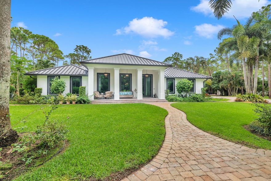 All Sizes Approx! Exquisite, Pristine And Private Equestrian Estate! New To The Market. A Complete Luxury Renovation That Was Just Finished in 08/2023! Owners Intended For This To Be Their Forever Home And Spared No Expense In This Luxury Renovation!  A Breath Of Fresh Air To  Equestrian Architecture And Design! All The Work Has Been Done For You! Home Offers 3500 sq. ft. Of Living Area And Almost 5000 Of Total Area! Four Bedrooms And Three Full Baths! Six Stall Center Isle Barn, Feed, Tack, Restroom And Large Storage Area. Stalls Have Run Out Paddocks. Large Grazing Area. New Watered Riding Arena And Viewing Area, Home Barn And Tiki Have New Medal Roofs (2023) Upon Entering The Property You Will Be Welcomed By The Custom Entry Gates And Paver Circular Driveway. SEE REMARKS FOR MORE DETAI