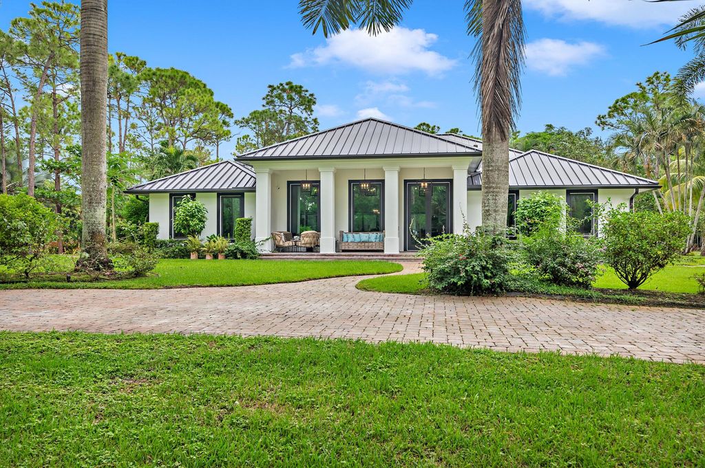 Photo of 14689 Crazy Horse Lane, Palm Beach Gardens, FL 33418 (MLS # R10930189)