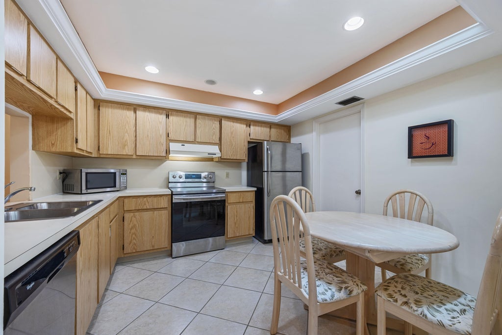 Photo of 9 Ridge Pointe Drive #D, Boynton Beach, FL 33435 (MLS # B26050063)