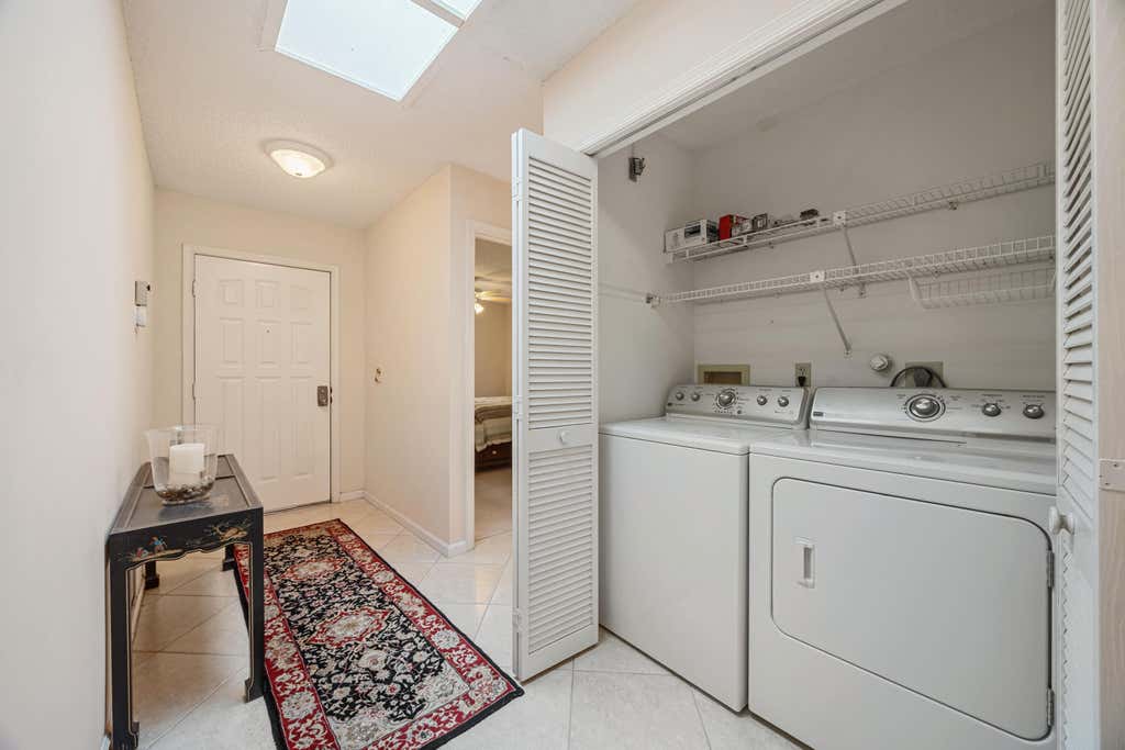 Photo of 9 Ridge Pointe Drive #D, Boynton Beach, FL 33435 (MLS # B26050063)