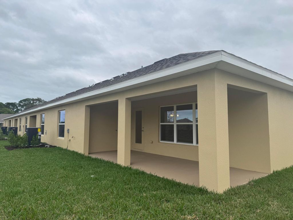 Photo of 8664 Giovanni Avenue, Fort Pierce, FL 34951 (MLS # R11148011)