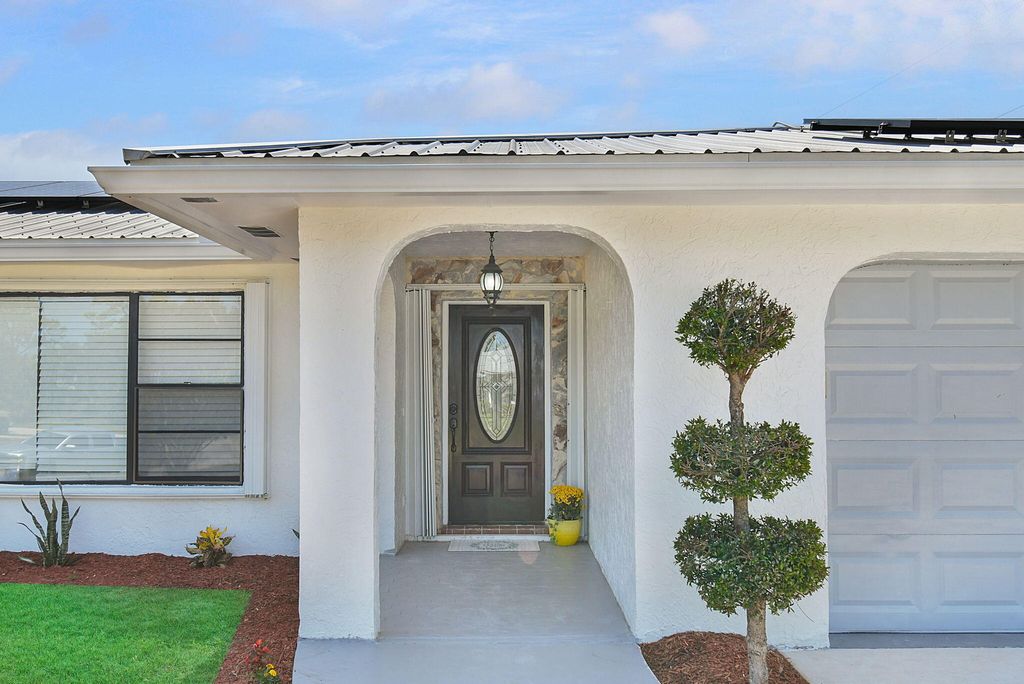 Photo of 397 NE Gulfstream Avenue, Port Saint Lucie, FL 34983 (MLS # R11088904)