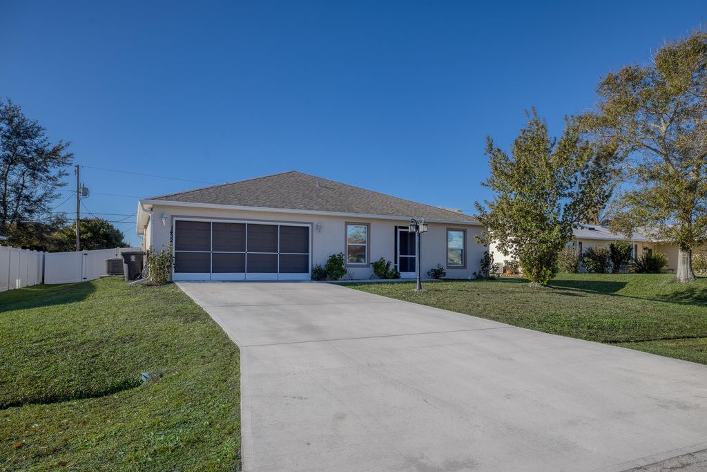 Photo of 1432 SW Leisure Lane, Port Saint Lucie, FL 34953 (MLS # R11160923)