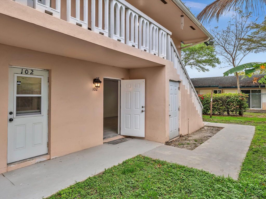 Photo of 7430 Kimberly Boulevard #102d, North Lauderdale, FL 33068 (MLS # B26003923)