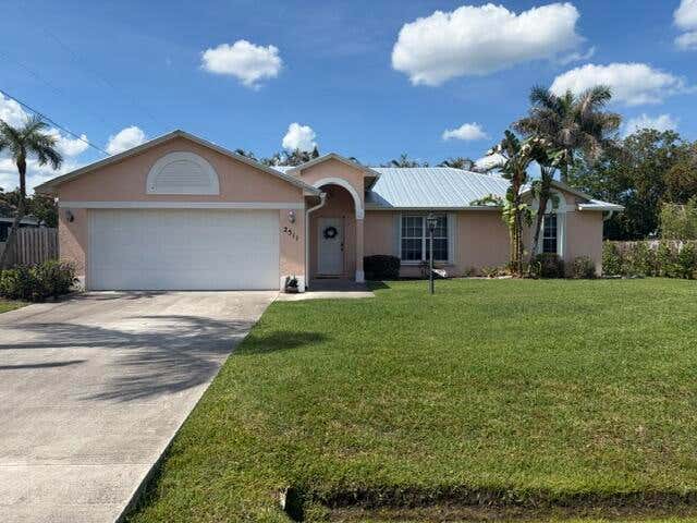 Photo of 2511 SE Jason Avenue, Port Saint Lucie, FL 34952 (MLS # B26041472)