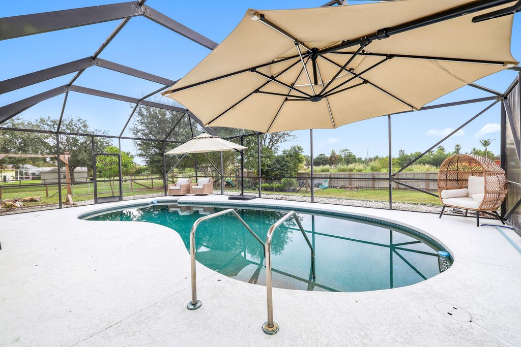 Photo of 17796 38th Road N, The Acreage, FL 33470 (MLS # R10949532)