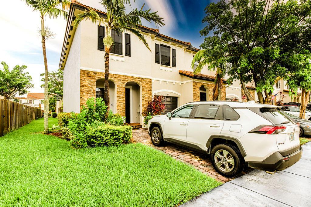 Congrats on finding this gem in the resort-style Silver Palms community, a 1,740-unit well-maintained subdivision with tons of social activities and events for the family to enjoy! The clubhouse features complimentary wi-fi, a spacious pool with spa & separate kid's splash pool, state-of-the-art fitness center, basketball court, children's playground, grand party room with kitchen inside and an outdoor Gazebo with BBQ to name a few. The 3/2.5 unit includes wood floors upstairs with all the bedrooms and tile on main floor. Enjoy stainless steel appliances and granite countertops in your open kitchen. You will also find 2 walk-in closets & a large patio perfect for gatherings and future memories. Excellent location, just minutes to the turnpike, shopping centers, schools, & Florida Keys!