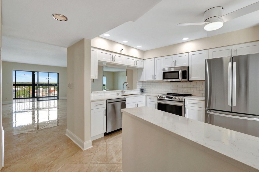 Photo of 14460 Strathmore Lane, Delray Beach, FL 33446 (MLS # B26020508)