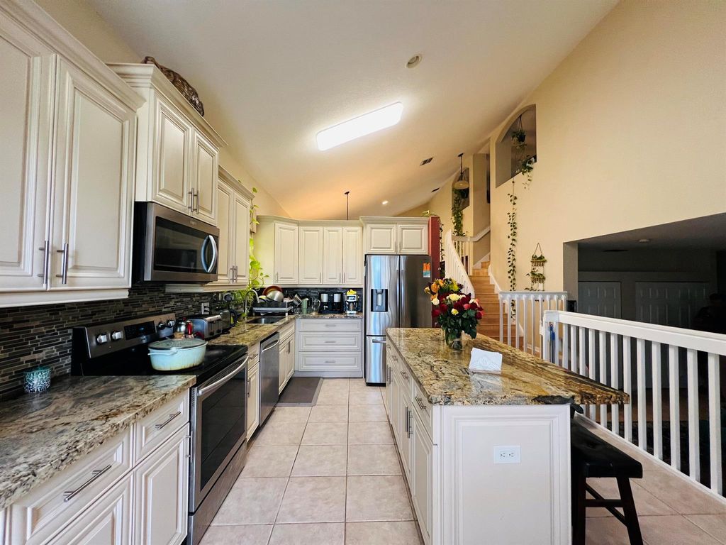 Photo of 7859 Springvale Drive, Lake Worth, FL 33467 (MLS # R11091115)