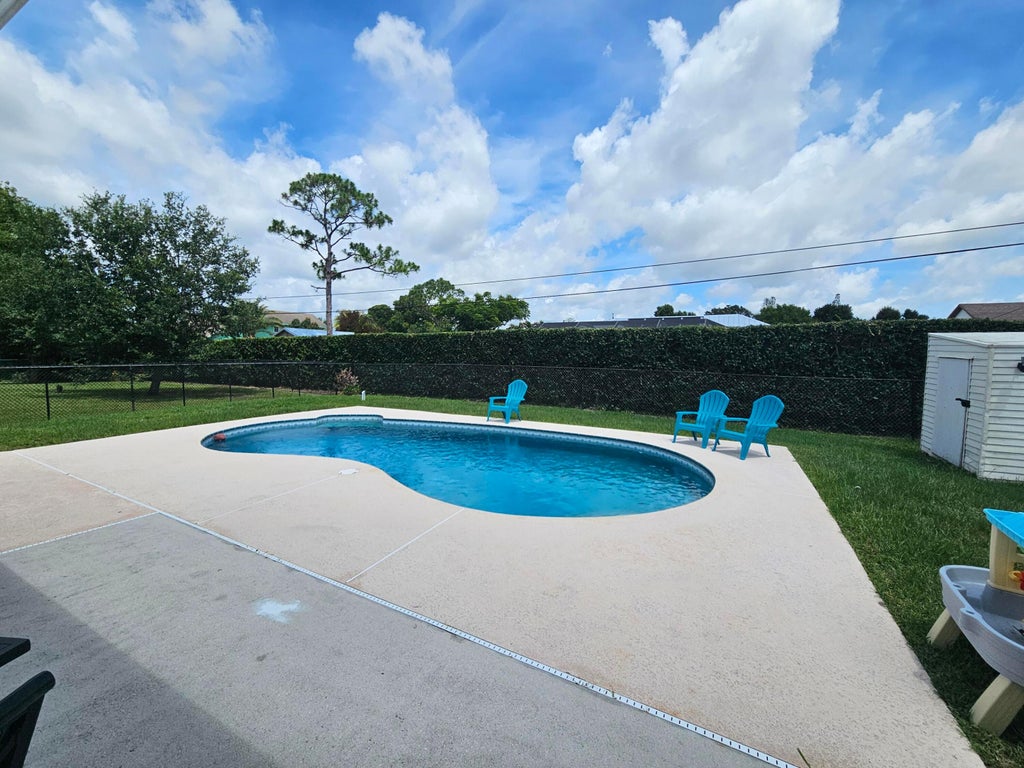 Photo of 2388 SW Fern Circle, Port Saint Lucie, FL 34953 (MLS # B26037020)