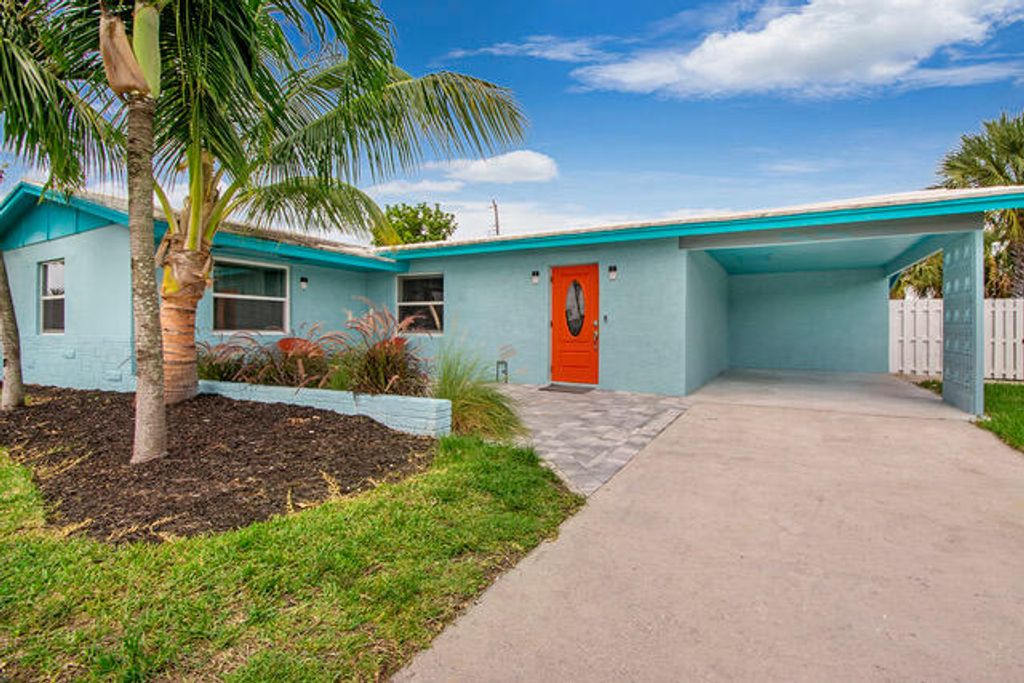 Photo of 3131 Avenue H E, Riviera Beach, FL 33404 (MLS # B26033188)
